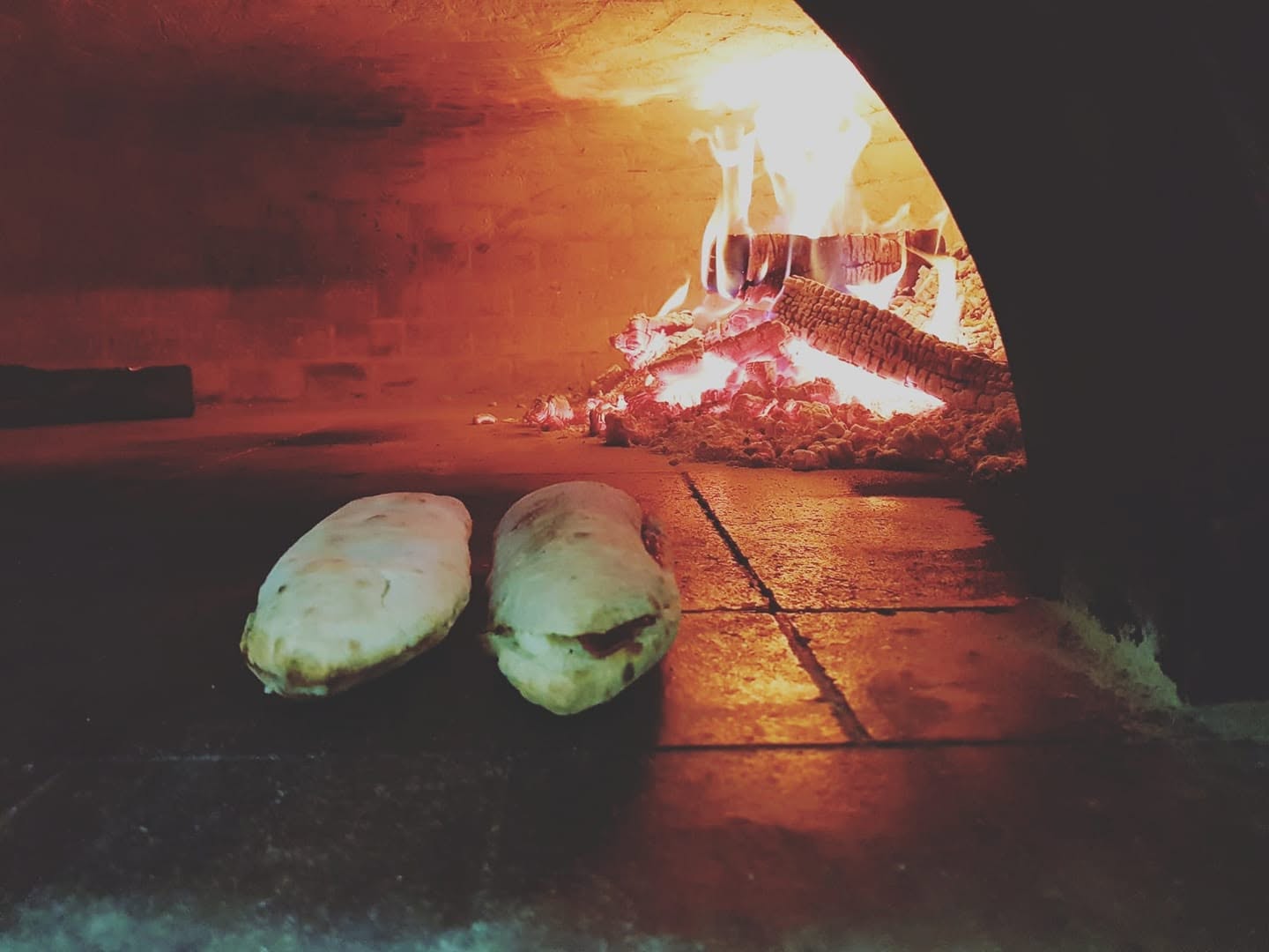 Paposce nel forno a legna